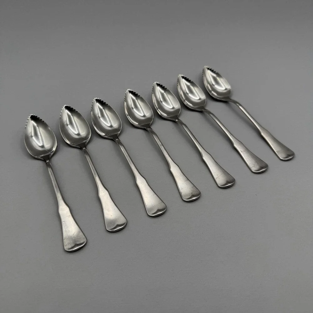 Oneida Community PATRICK HENRY 7pcs Grapefruit Spoons Serrated Stainless